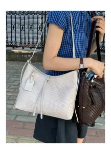 Retro woven underarm shoulder bag for women, stylish niche design handbag for daily outfit.