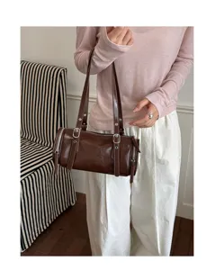 Bolso de hombro cilíndrico marrón para mujer, bolso de almohada retro de piel PU para uso diario.