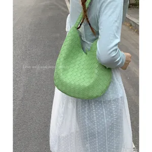 Summer large capacity woven shoulder bag for women, stylish green commuter handbag.