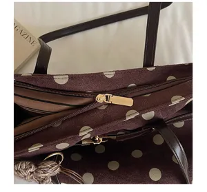 Brown suede polka dot tote bag detail view, showing vintage design, zipper and inner lining.