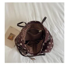 Retro polka dot suede tote bag with spacious interior and striped lining for autumn and winter.