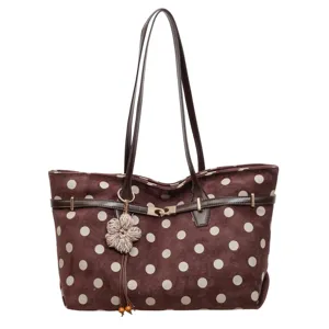 Brown suede polka dot tote bag with long shoulder handles and cute flower pendant for women.