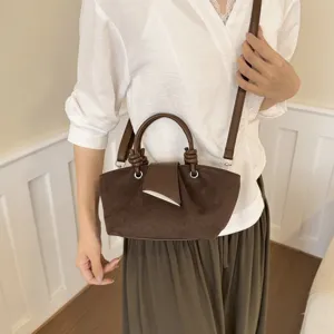 Retro brown suede crossbody bag for women minimalist versatile shoulder tote with knotted handle.