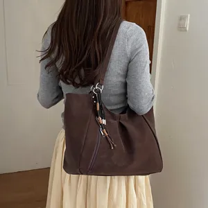 Stylish brown shoulder bag for women, large capacity minimalist tote bag for daily commute.
