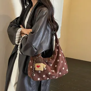 Retro brown polka dot suede shoulder bag for women, stylish underarm tote and crossbody bag.