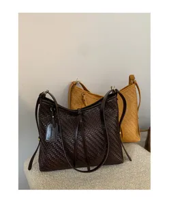 Woven shoulder bag for women, vintage leather hobo handbag, elegant daily commuter purse style.