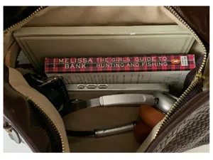 Detailed interior view of the vintage brown woven shoulder bag showcasing daily essentials.