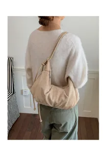 Vintage suede hobo shoulder bag for women, minimalist dumpling bag autumn winter.