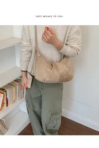 Retro suede dumpling shoulder bag, autumn winter minimalist casual crossbody bag for women.