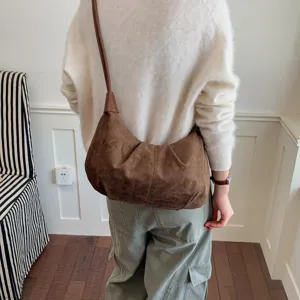 Retro brown suede underarm bag for women, minimalist shoulder hobo dumpling bag.
