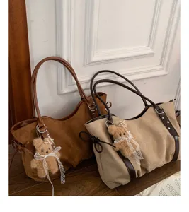 Casual suede tote bag for women, large capacity shoulder bag with cute fluffy bear charm.
