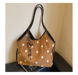 Retro brown suede shoulder tote bag for women with plush white polka dots and bead charm.