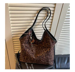 Vintage leopard print shoulder tote bag for women, chic faux suede handbag with black straps.