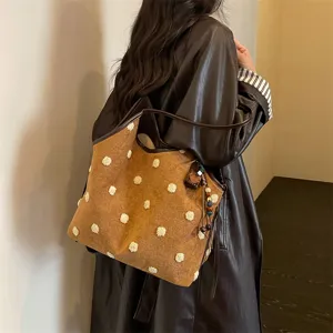 Retro plush polka dot suede shoulder tote bag for women, elegant brown underarm handbag.