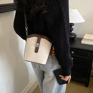 Borsa a secchiello opaca francese da donna, elegante borsa a tracolla minimalista.