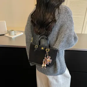 Niche texture womens handbag, new suede tote bag with floral pendant, large capacity shoulder bag.