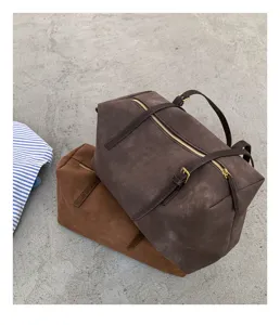 Retro large capacity suede pillow shoulder bag detail view with metal zipper and strap