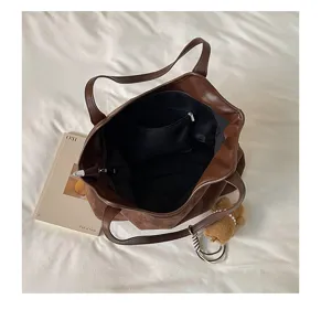 Retro brown suede tote bag detail, large capacity minimalist shoulder bag with inner pocket.