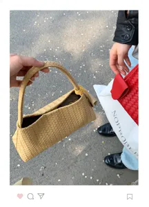 Woven shoulder bag for women, stylish casual commute handbag with classic braided design.