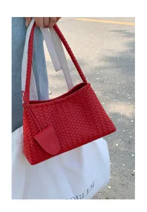 Chic red woven underarm shoulder bag for women, stylish commuting handbag with braided design.