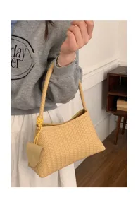 Woven underarm shoulder bag for women, stylish commuting handbag with chic woven texture design.