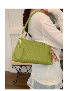 Chic green woven shoulder bag for women, stylish leather underarm bag for daily commute.