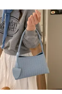 Light blue woven leather shoulder bag for women, stylish underarm handbag with chic knot.