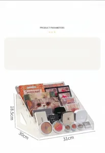 Transparent acrylic tiered display rack for nail polish, eyeshadow palettes and cosmetics.