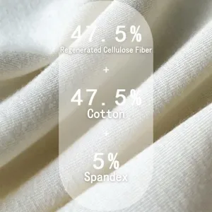 Close-up view of soft white fabric texture showing modal cotton and spandex material details.