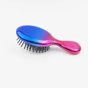 Brosse à cheveux électrolytique dégradée avec picots souples pour massage du cuir chevelu.