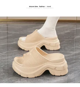 Platform slide sandals detail showcasing thick chunky heel and comfortable open toe design.