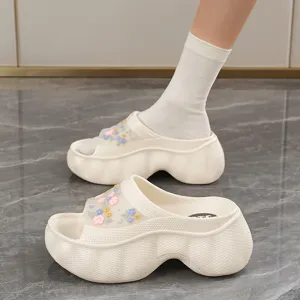 Chic thick sole platform slide sandals for women, stylish floral upper, cozy summer beach shoes.