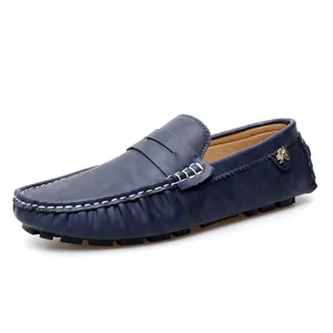 Men's blue leather loafer casual slip-on driving shoes with white stitching details.