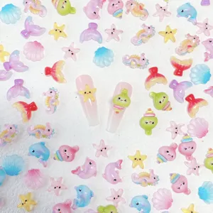 Cute resin ocean animal nail art charms and DIY phone case accessories detail display.