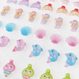 Cute resin marine animal nail art charms and DIY phone case cabochons, colorful pieces.
