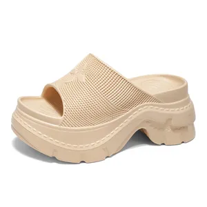 Thick platform slide sandals for women, open toe summer beach outdoor casual shoes in beige.