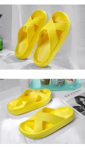 Yellow thick-soled cross strap slippers detail showing soft texture and anti-slip sole design.