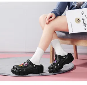 Platform clogs for women, black thick sole casual beach shoes, stylish summer footwear.