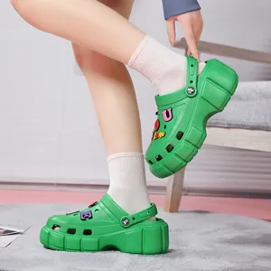 Green platform clogs for women, stylish thick-bottom garden shoes with cute letter charms for summer.