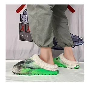 Winter fuzzy warm couple clogs detail shot, green tie-dye plush lined casual indoor shoes.