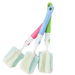 Cepillo de esponja multiusos con mango largo para limpiar botellas y ollas de cocina.
