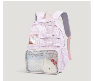 Japanse JK roze geruite Ita rugzak met doorzichtig venster, strik en schattig pluche dier voor studenten.