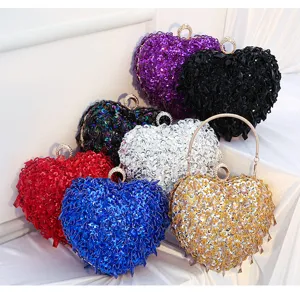 Heart shaped sequin beaded evening clutch bag details showing multiple colors and design.