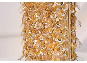 Close-up detail of luxurious vintage handmade beaded evening clutch bag with gold sequins and crystals.