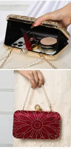 Elegant rhinestone evening clutch bag with pearl handle and sparkling floral design.
