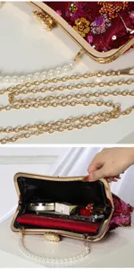 Red sequin evening bag with pearl handle and gold chain, elegant clutch for party dress.
