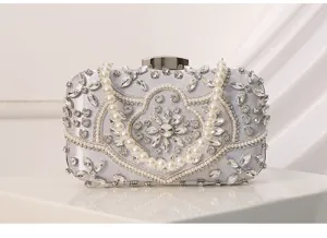 Elegant silver rhinestone evening clutch bag with pearl handle for women wedding party.