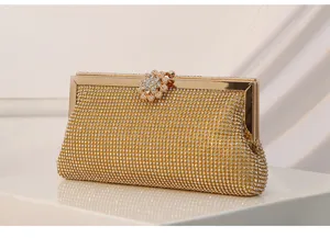 Elegant gold rhinestone evening clutch bag with sparkling crystal floral clasp for weddings.