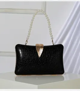 Elegant black evening clutch bag with pearl handle and gold leaf clasp for women party.
