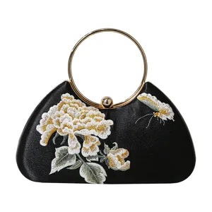 Elegante bolso de noche bordado retro chino con asa de metal redonda para vestido qipao.